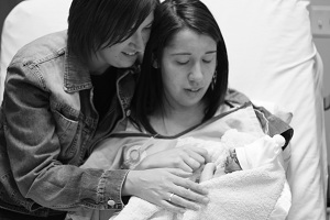 April with her daughter and granddaughter with anencephaly