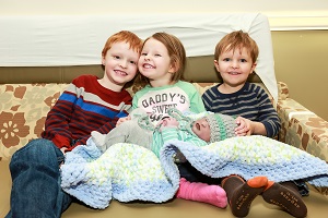 Emmanuel with his siblings