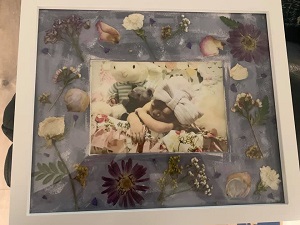 memorial picture frame for Elaina made with dried flowers 