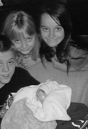 Michael David with his siblings